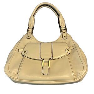 East 5th cream colored handbag.